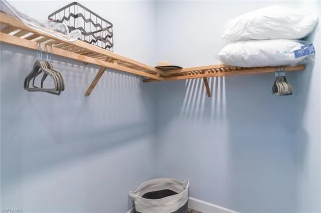 a bathroom with a shower curtain and a sink