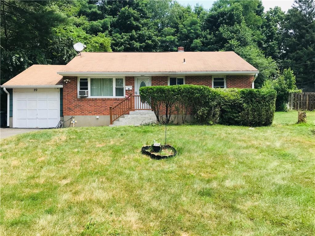 70 Hempstead Road Spring Valley, NY 10977 - Photo 1 of 1 a view of a white house with a yard plants and large tree