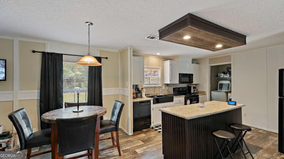 64 Sierra Road Jesup, GA 31545 - Photo 8 of 22 a view of a dining room with furniture window and outside view