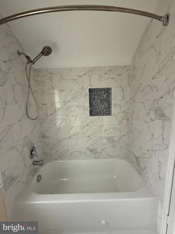 a bathroom with a bathtub