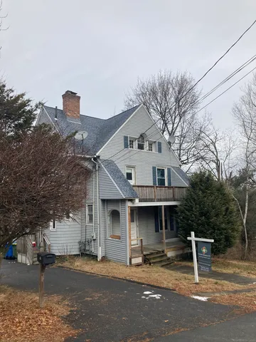 a front view of a house with garage