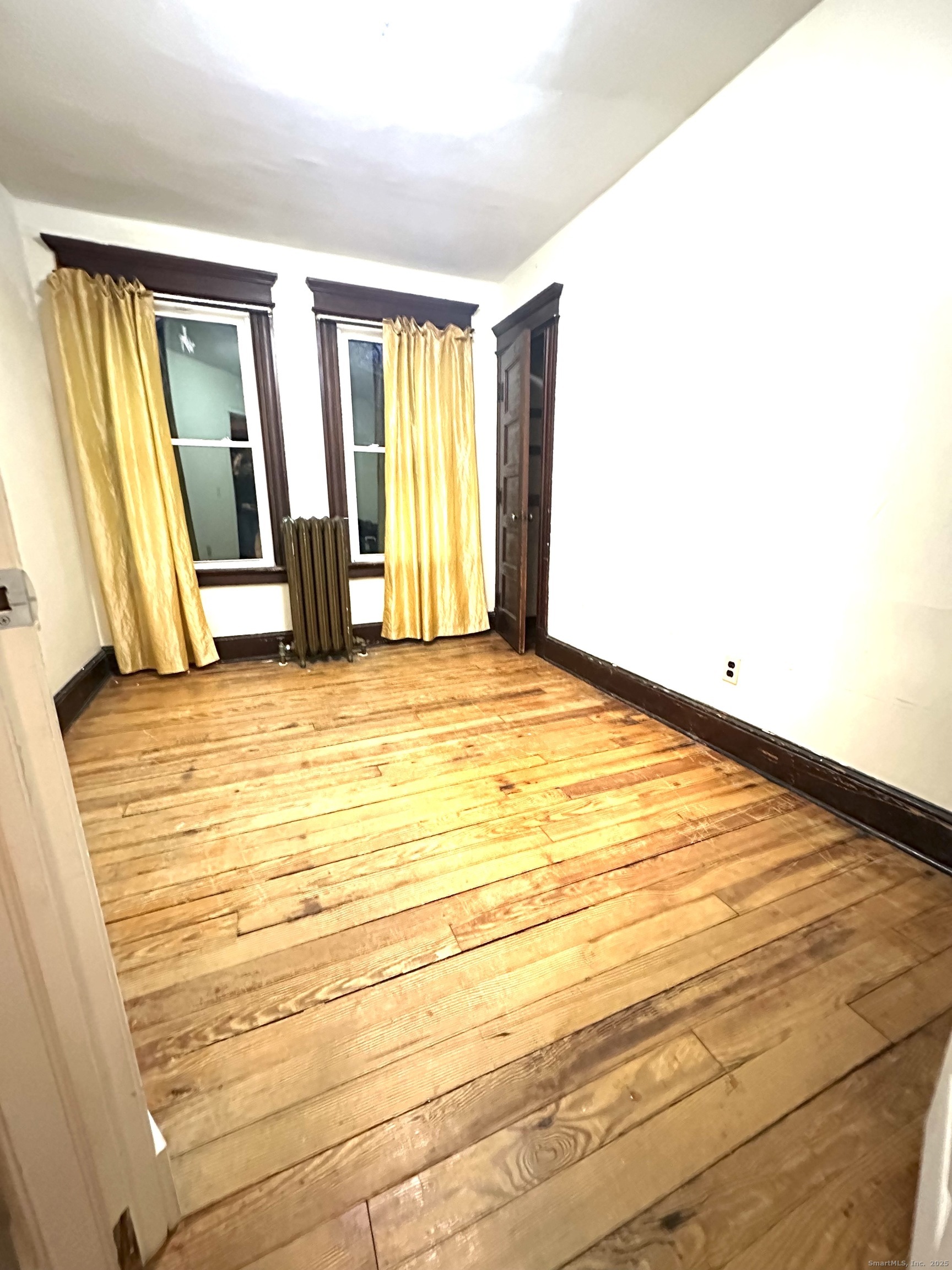 24 Maynard Avenue Waterbury, CT 06708 - Photo 11 of 32 a view of an empty room with window