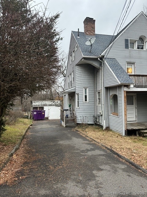24 Maynard Avenue Waterbury, CT 06708 - Photo 4 of 32 a view of a house with a outdoor space