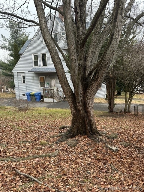 24 Maynard Avenue Waterbury, CT 06708 - Photo 5 of 32 a view of a house with a yard