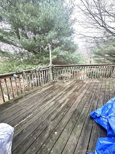 24 Maynard Avenue Waterbury, CT 06708 - Photo 9 of 32 a balcony with wooden floor