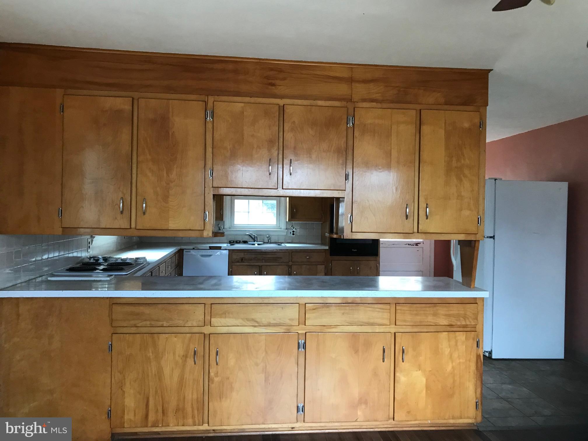 376 Coldstream Road Phoenixville, PA 19460 - Photo 8 of 24 Counter and Cabinets Between Kitchen/Dining Area