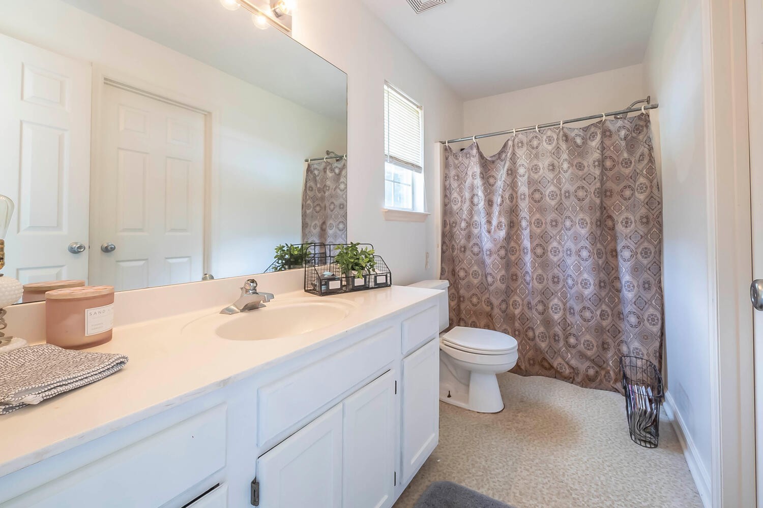131 Gaskins Road Burns, TN 37029 - Photo 12 of 25 a bathroom with a granite countertop sink toilet and shower