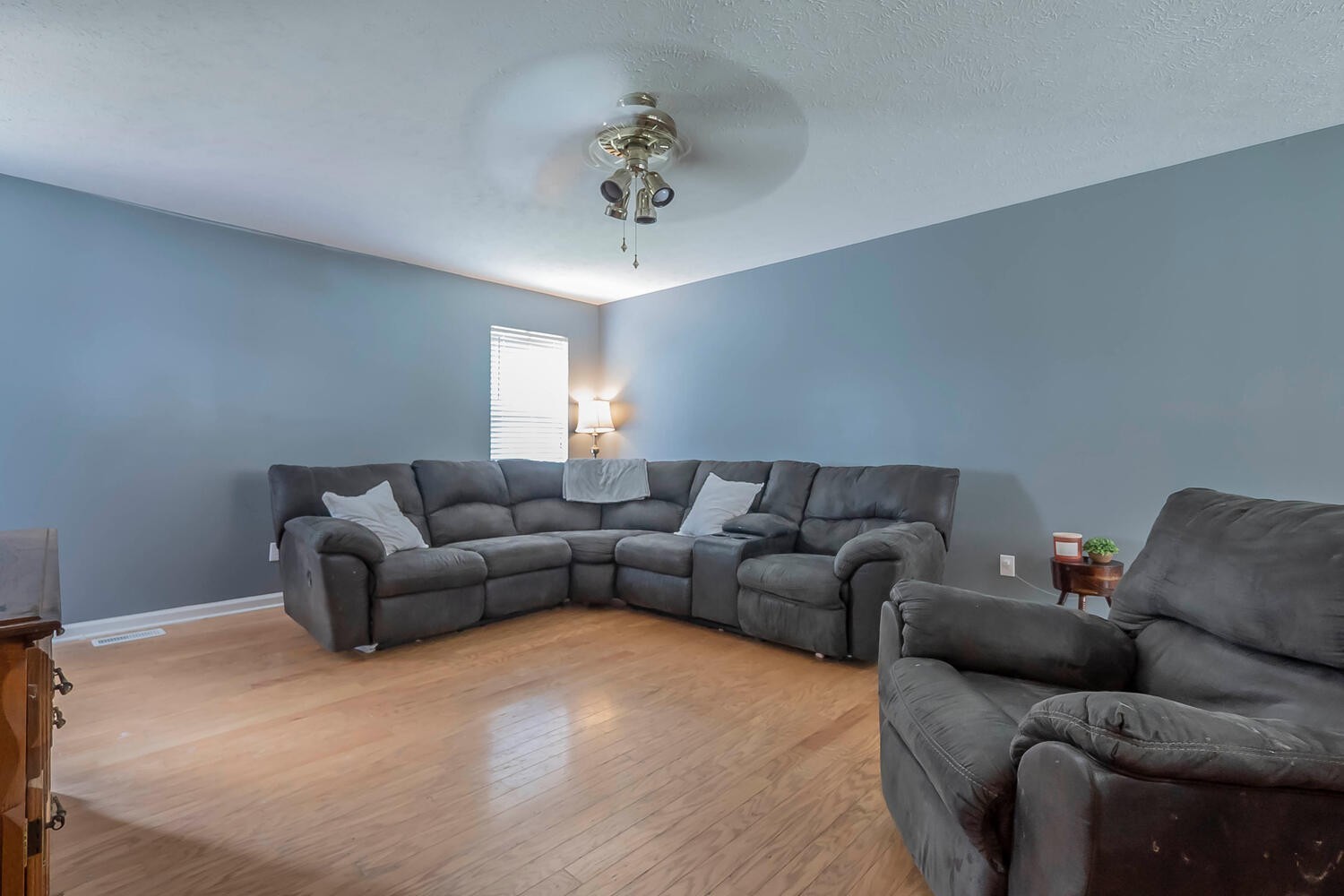131 Gaskins Road Burns, TN 37029 - Photo 5 of 25 a living room with furniture and a ceiling fan