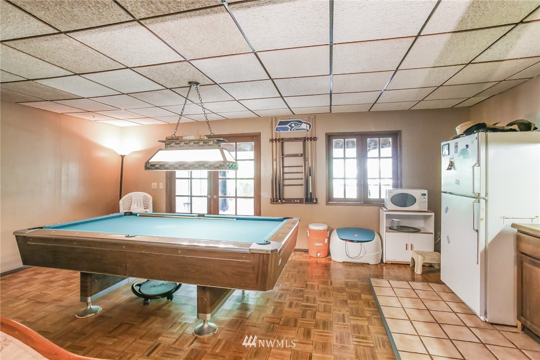 17848 156th Place Southeast Renton, WA 98058 - Photo 17 of 24 a room with pool table and windows