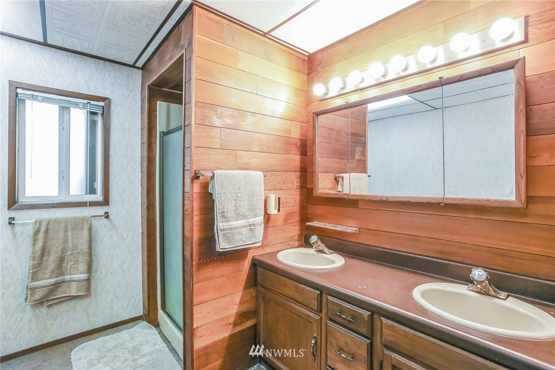 17848 156th Place Southeast Renton, WA 98058 - Photo 18 of 24 a bathroom with a sink and a mirror