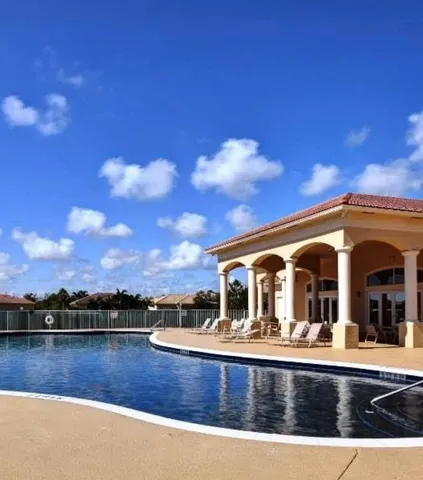 a front view of house with yard and entertaining space