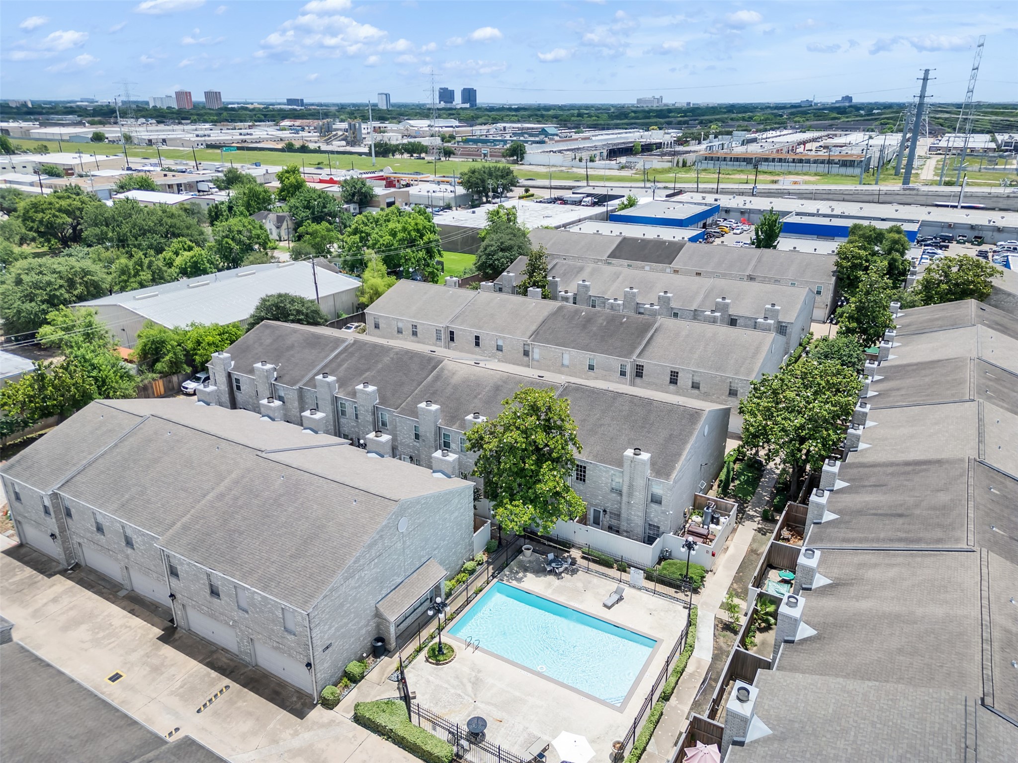 4001 Tanglewilde Street, Unit 605 Houston, TX 77063 - Photo 26 of 29 an aerial view of a house with outdoor space and lake view