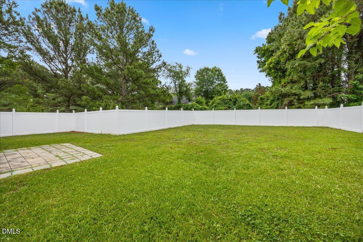 3831 Pin Oak Road Raleigh, NC 27604 - Photo 22 of 24 a view of an outdoor space and a yard