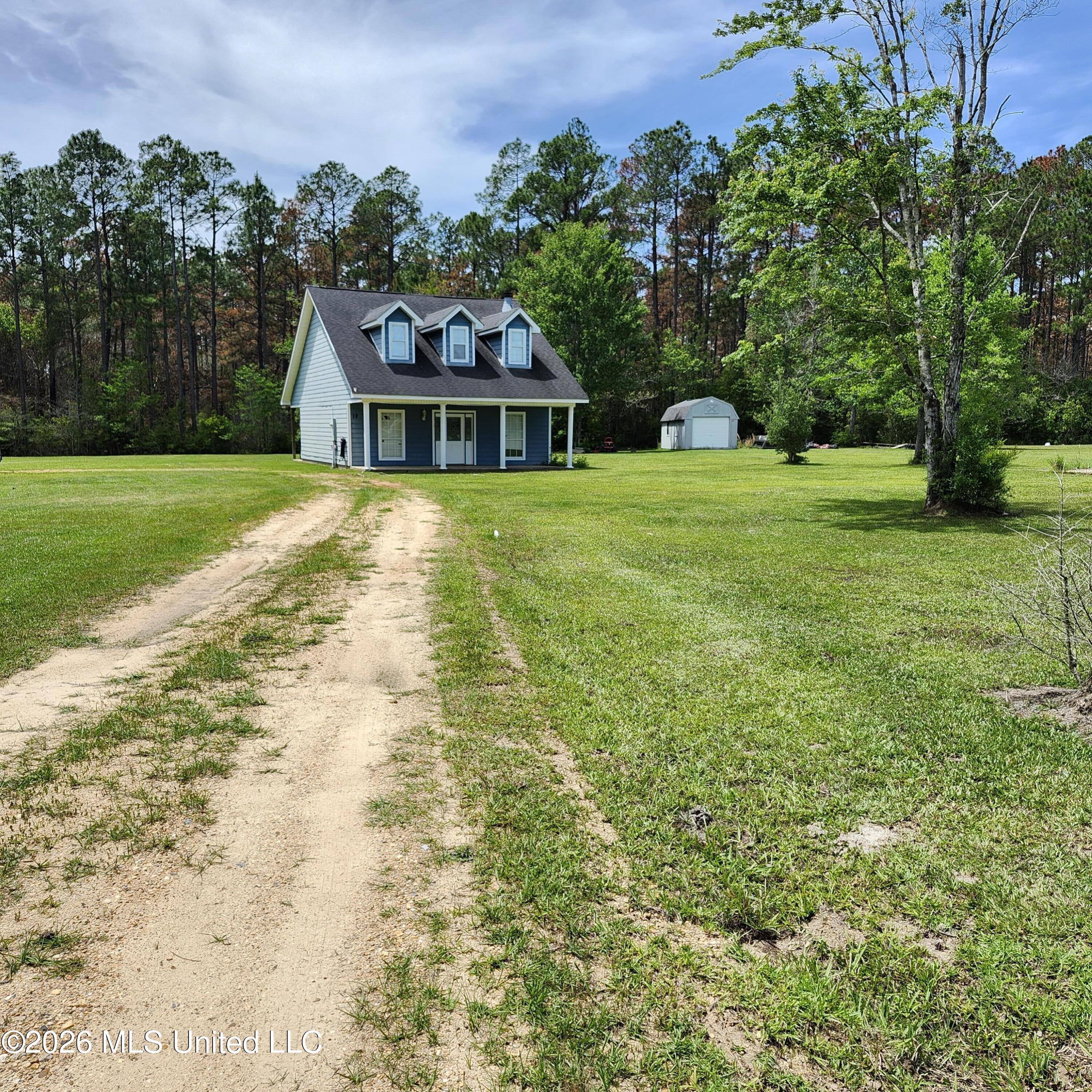 12 Austin Lane Perkinston, MS 39573 - Photo 2 of 54 Driveway View of House