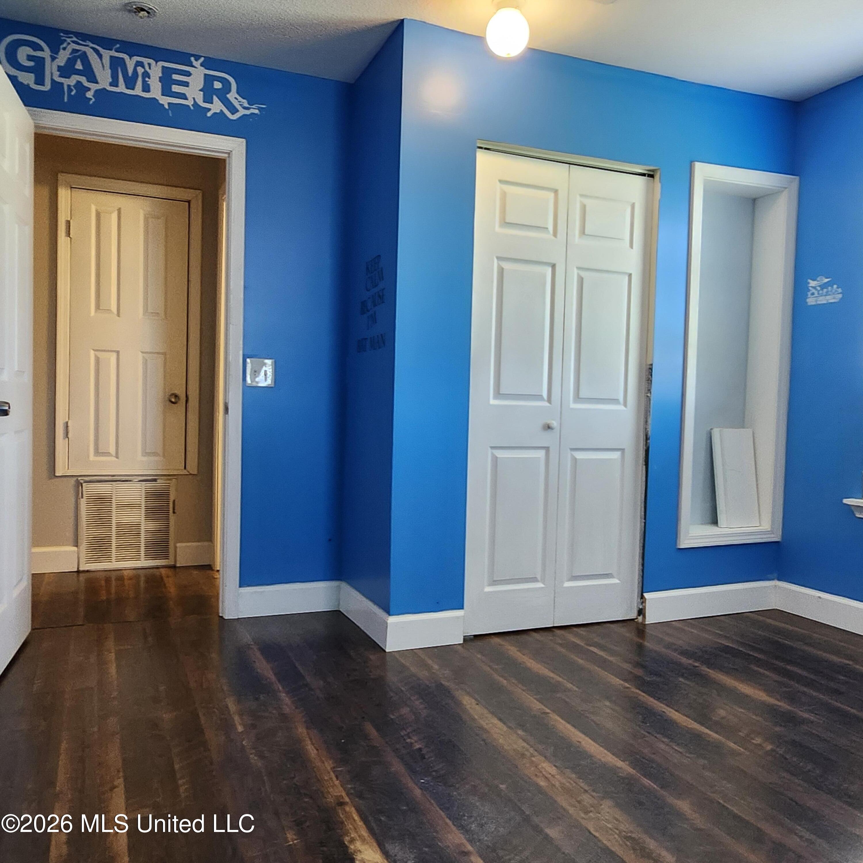 12 Austin Lane Perkinston, MS 39573 - Photo 33 of 54 Bedroom 2 looking towards hallway