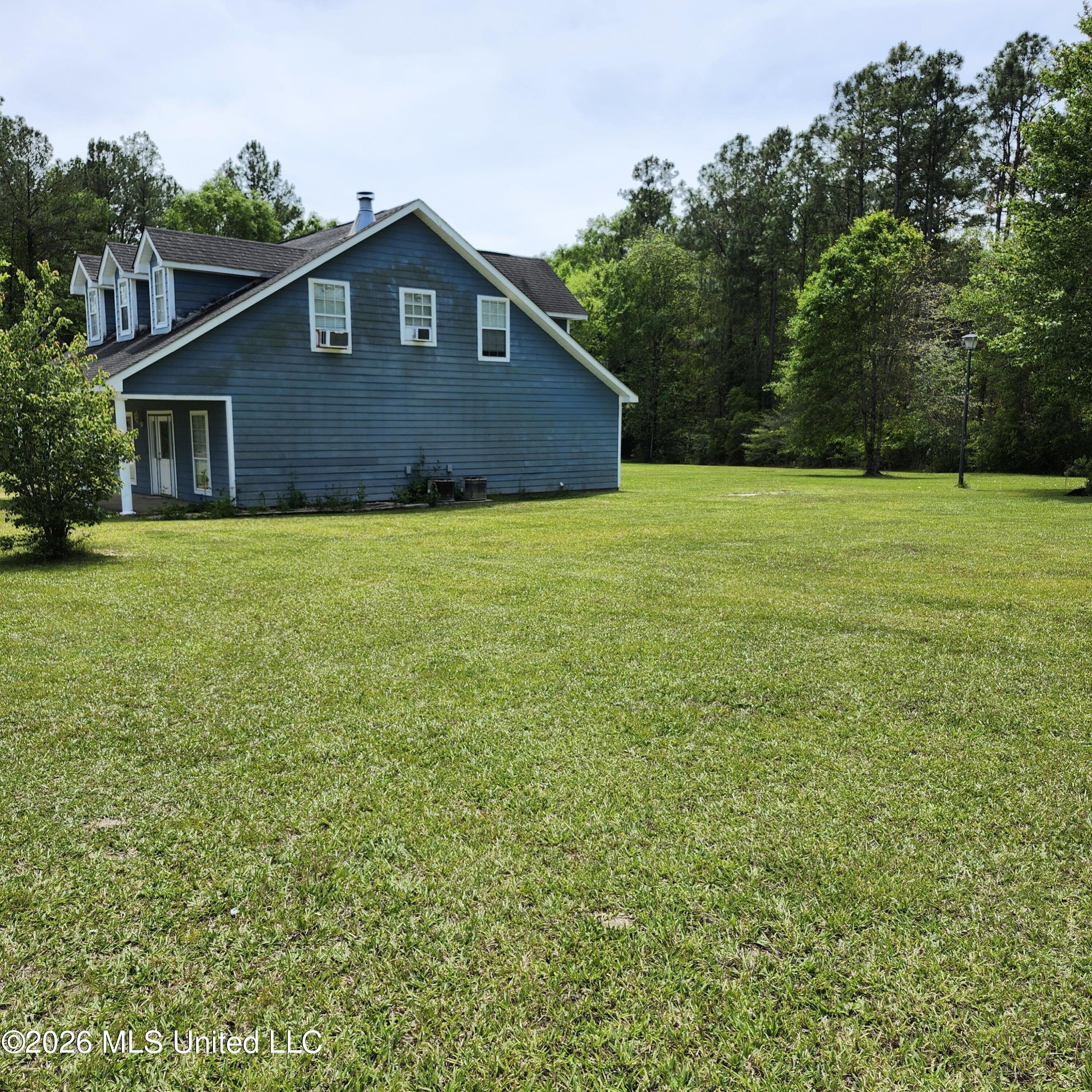 12 Austin Lane Perkinston, MS 39573 - Photo 4 of 54 Side view of house