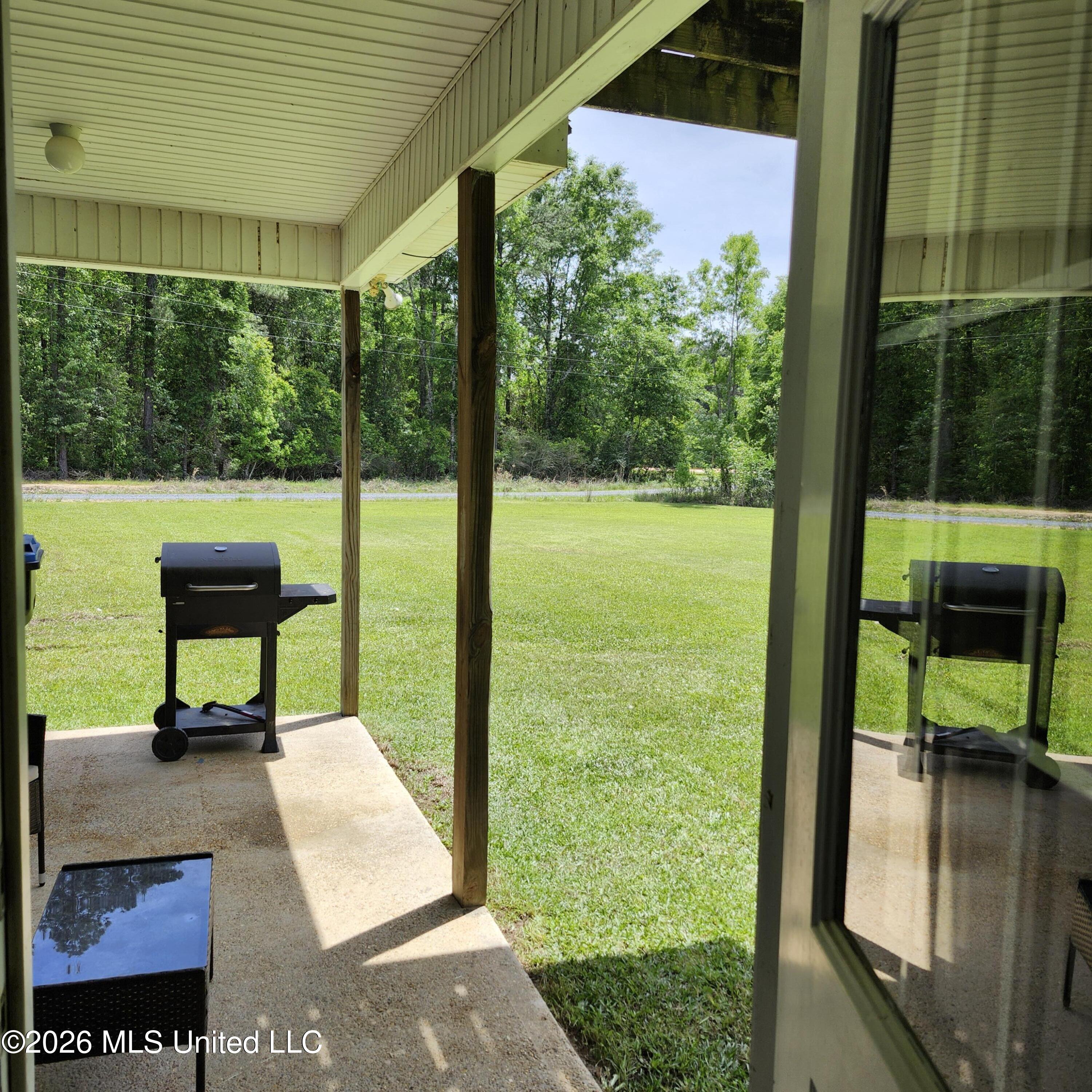 12 Austin Lane Perkinston, MS 39573 - Photo 53 of 54 backdoor to back porch