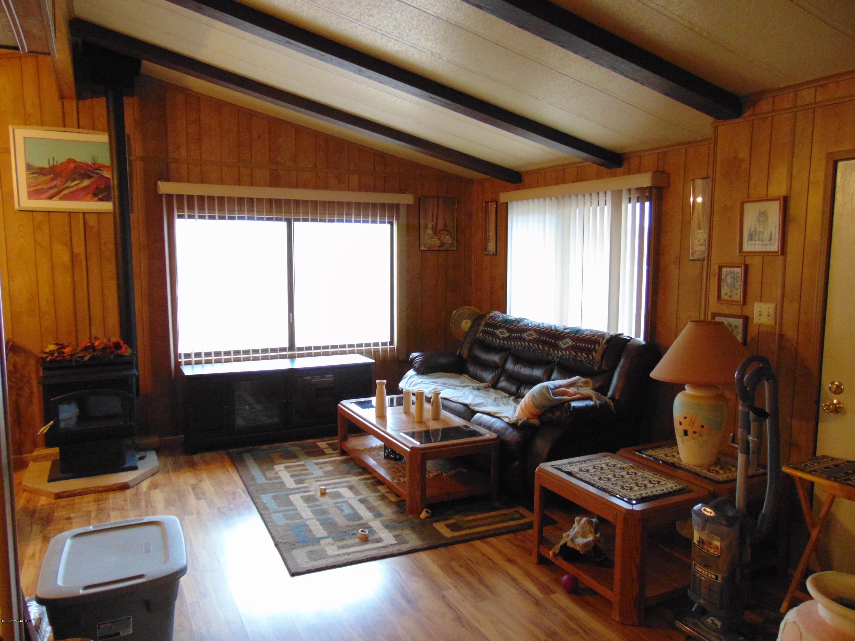 4715 Tagalong Trail Rimrock, AZ 86335 - Photo 11 of 30 a living room with furniture and a window