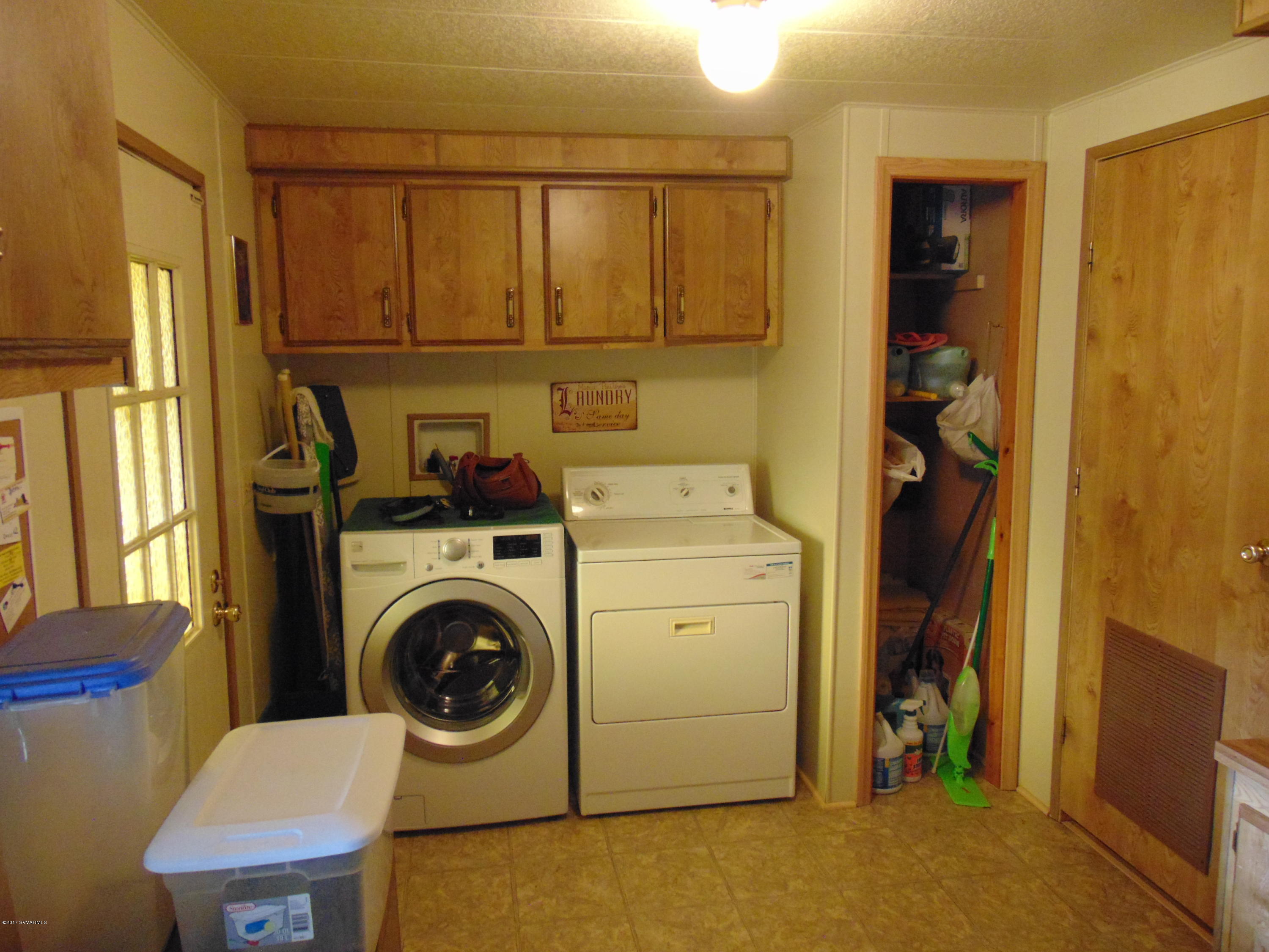 4715 Tagalong Trail Rimrock, AZ 86335 - Photo 15 of 30 a utility room with dryer and washer