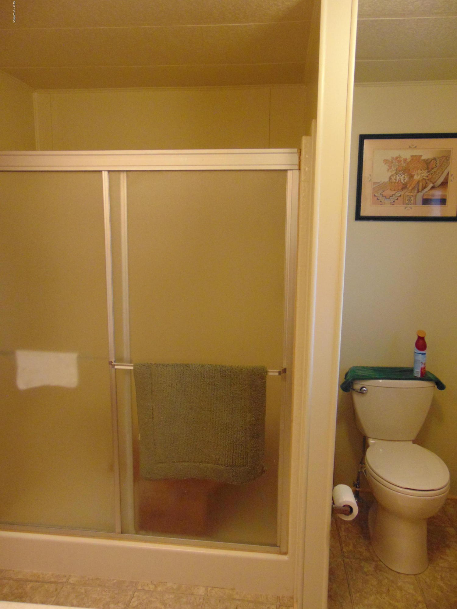 4715 Tagalong Trail Rimrock, AZ 86335 - Photo 20 of 30 a bathroom with a shower