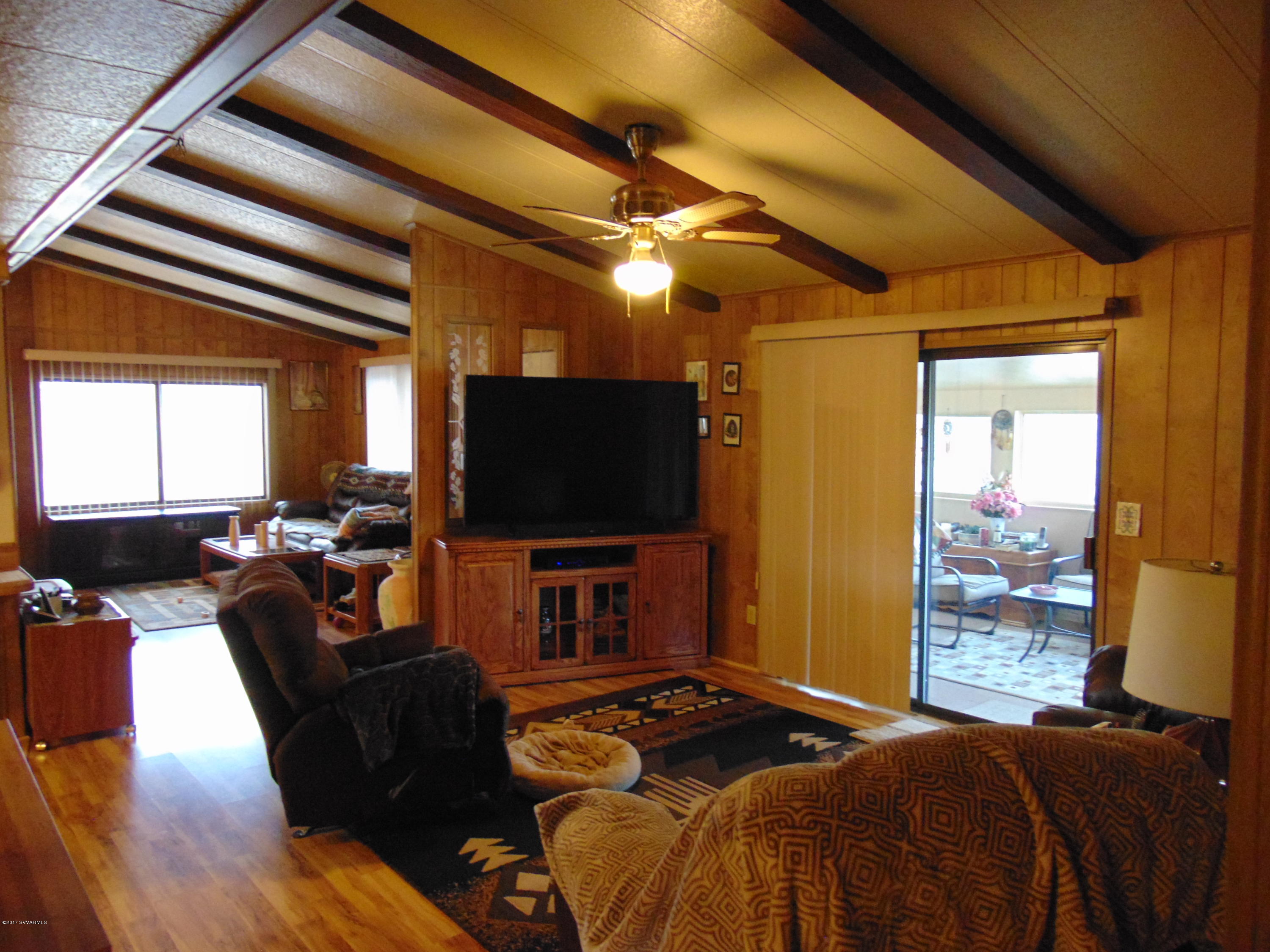 4715 Tagalong Trail Rimrock, AZ 86335 - Photo 7 of 30 a bedroom with furniture and a flat screen tv