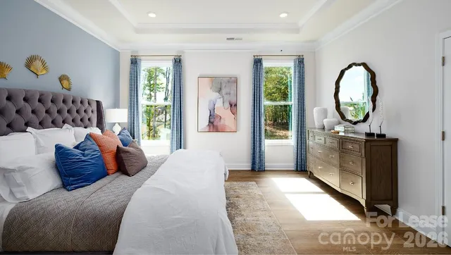 a bedroom with a bed and a cabinets