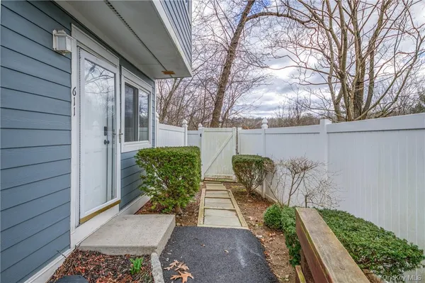 a view of a back yard of the house