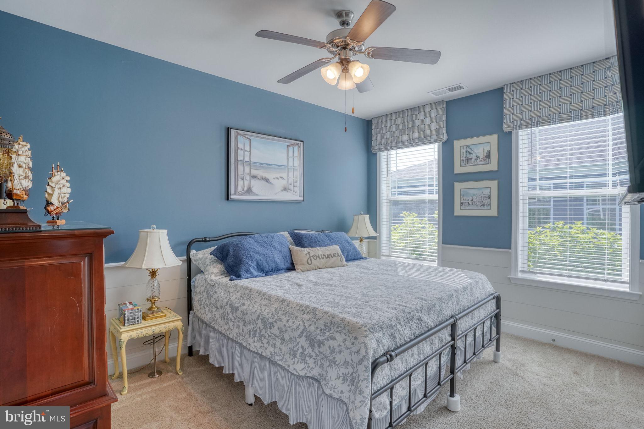 15272 Crape Myrtle Road Milton, DE 19968 - Photo 27 of 61 Serene blue-hued bedroom retreat.