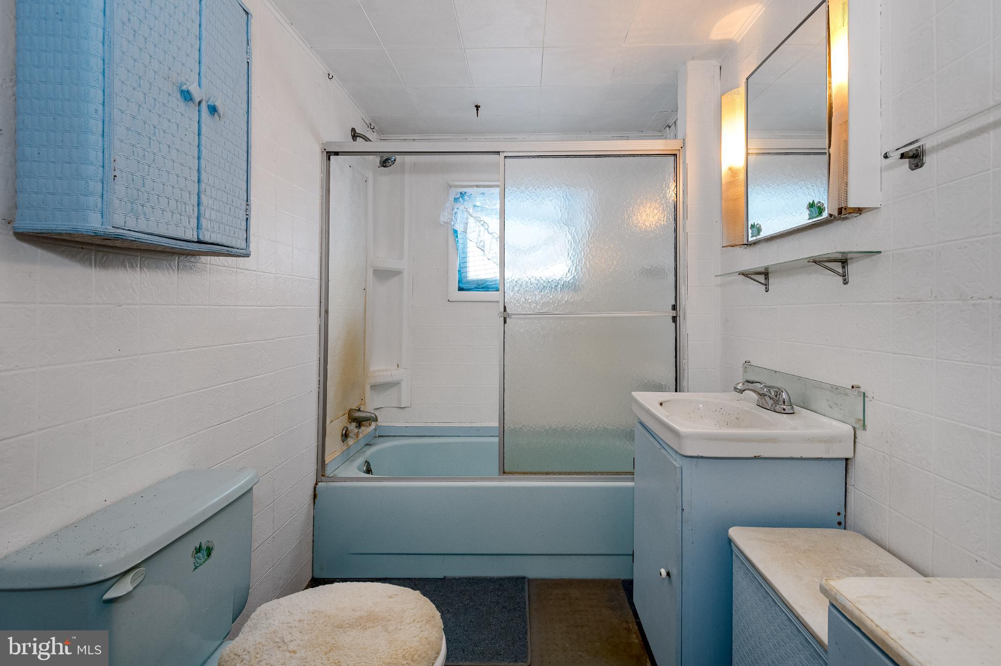 3416 Broadford Road Oakland, MD 21550 - Photo 15 of 23 Charming vintage bathroom with serene hues.