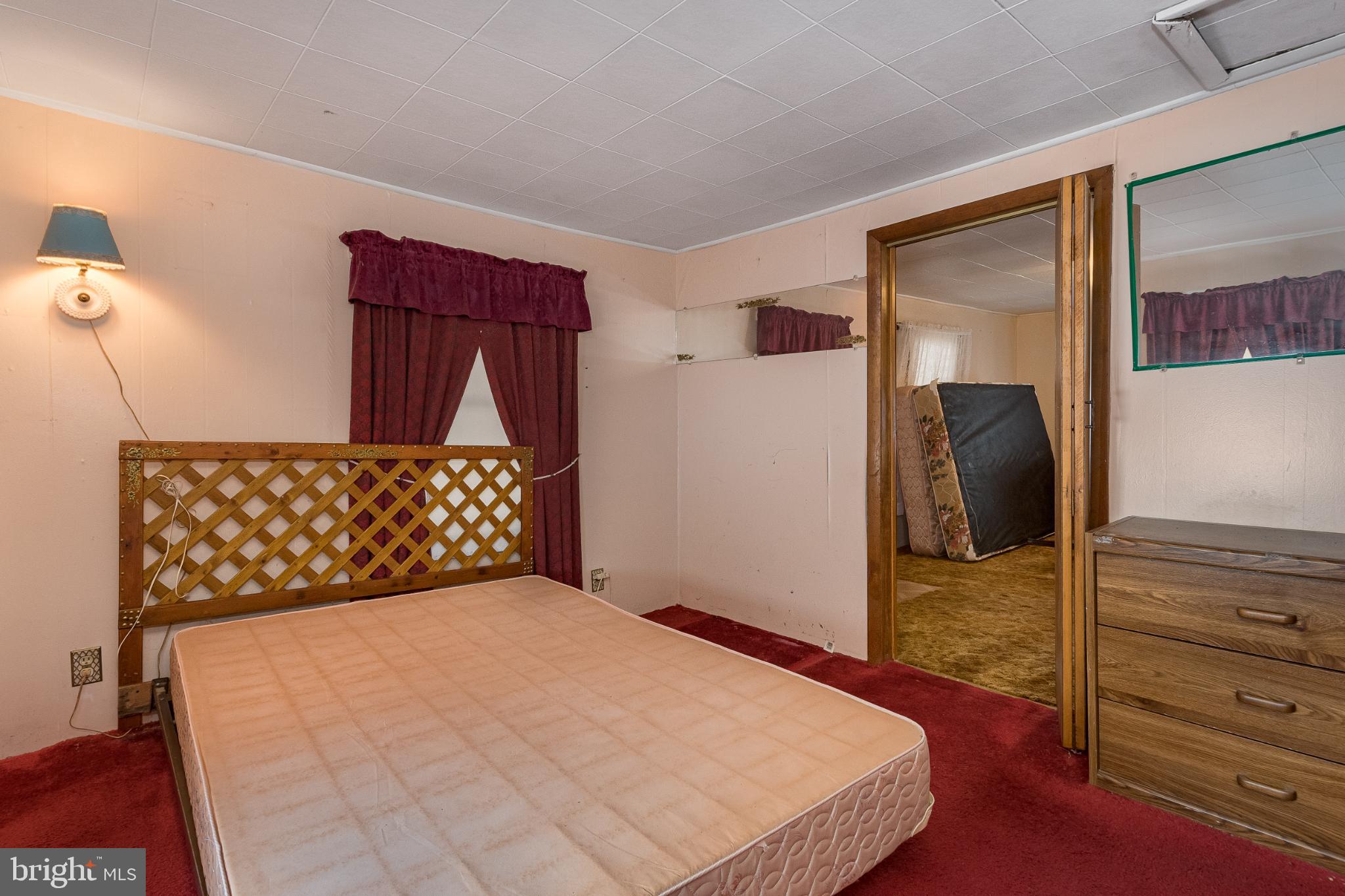 3416 Broadford Road Oakland, MD 21550 - Photo 17 of 23 Cozy bedroom with vintage charm and potential.