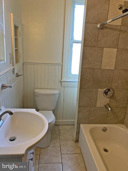 121 South Queen Street, Unit 3 York, PA 17403 - Photo 7 of 8 a bathroom with a sink and bathtub