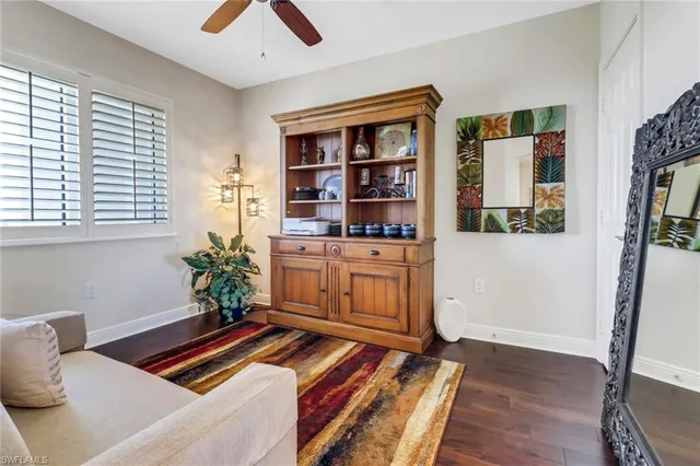 a living room with furniture and window