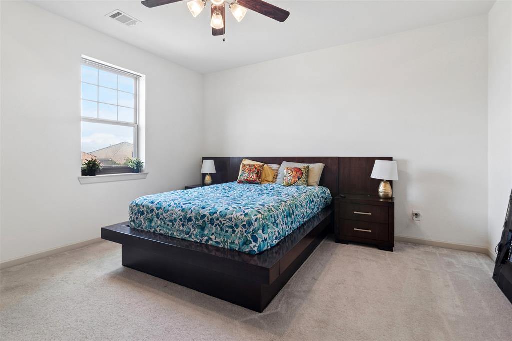6715 Castillo Street Irving, TX 75039 - Photo 20 of 24 a bedroom with a bed and window