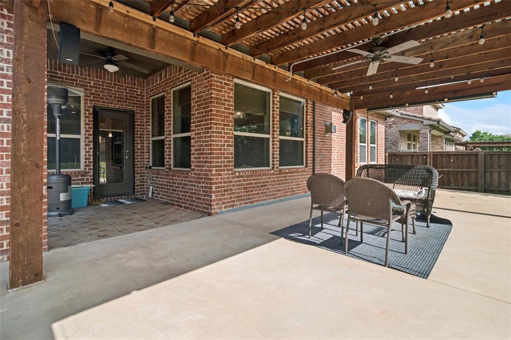 6715 Castillo Street Irving, TX 75039 - Photo 24 of 24 a patio with table and chairs