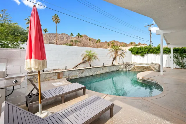 a view of a terrace with chairs