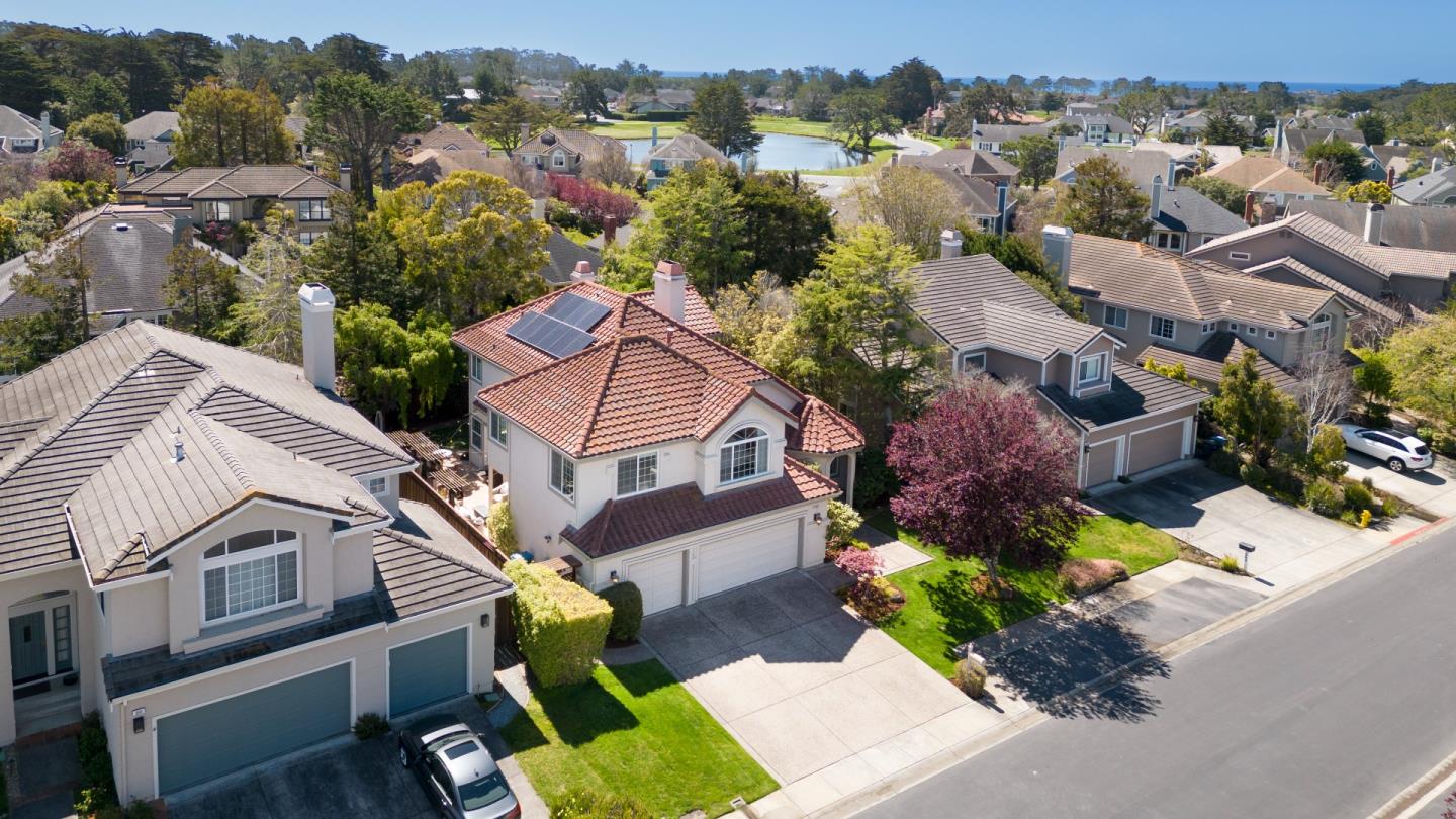 376 Eagle Trace Drive Half Moon Bay, CA 94019 - Photo 1 of 43 an aerial view of multiple houses with a yard
