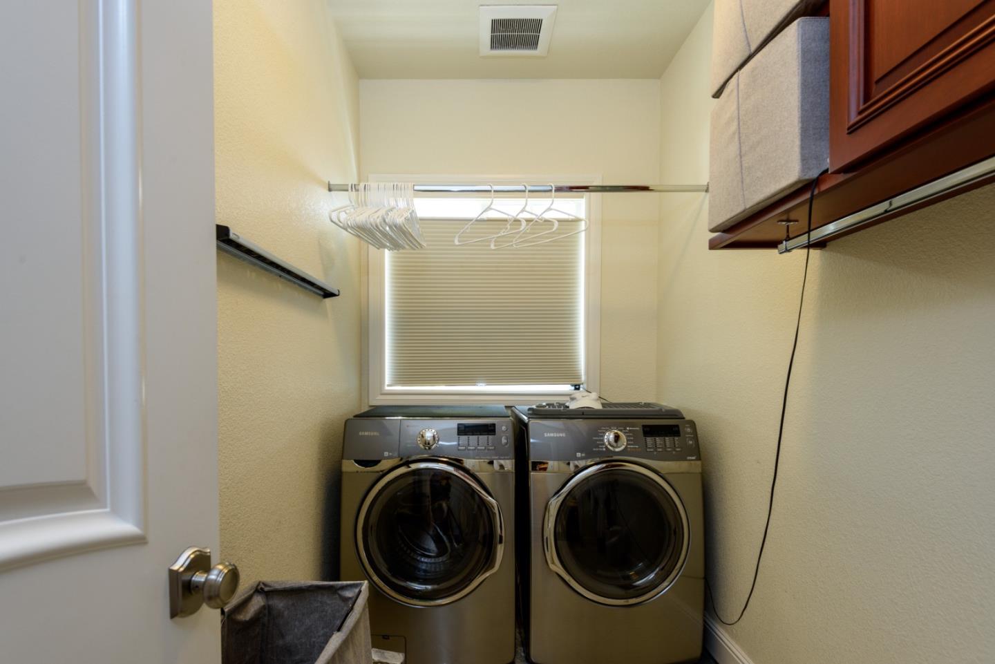 376 Eagle Trace Drive Half Moon Bay, CA 94019 - Photo 15 of 43 a view of a storage & utility room with a washer dryer