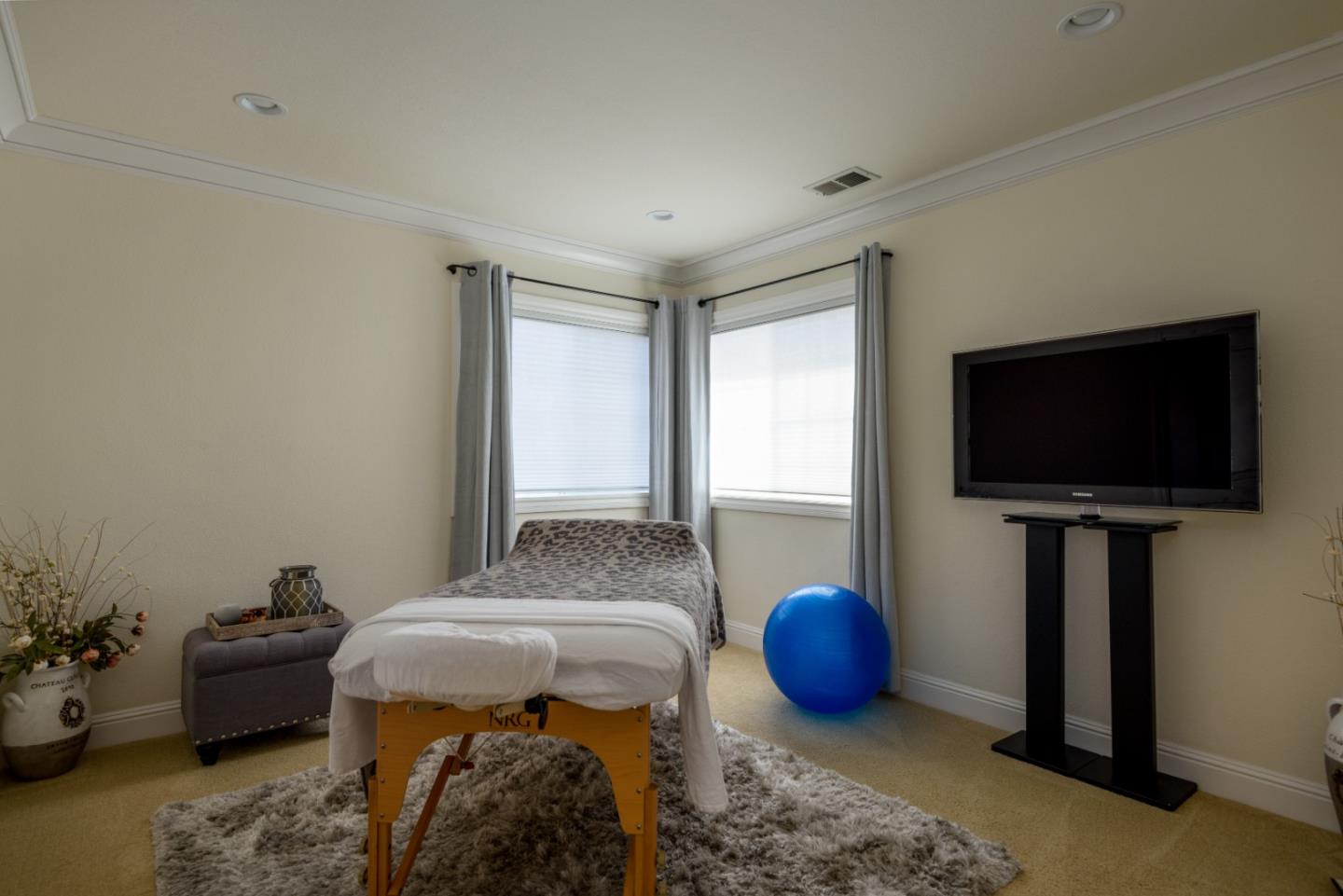 376 Eagle Trace Drive Half Moon Bay, CA 94019 - Photo 23 of 43 a living room with furniture and a flat screen tv
