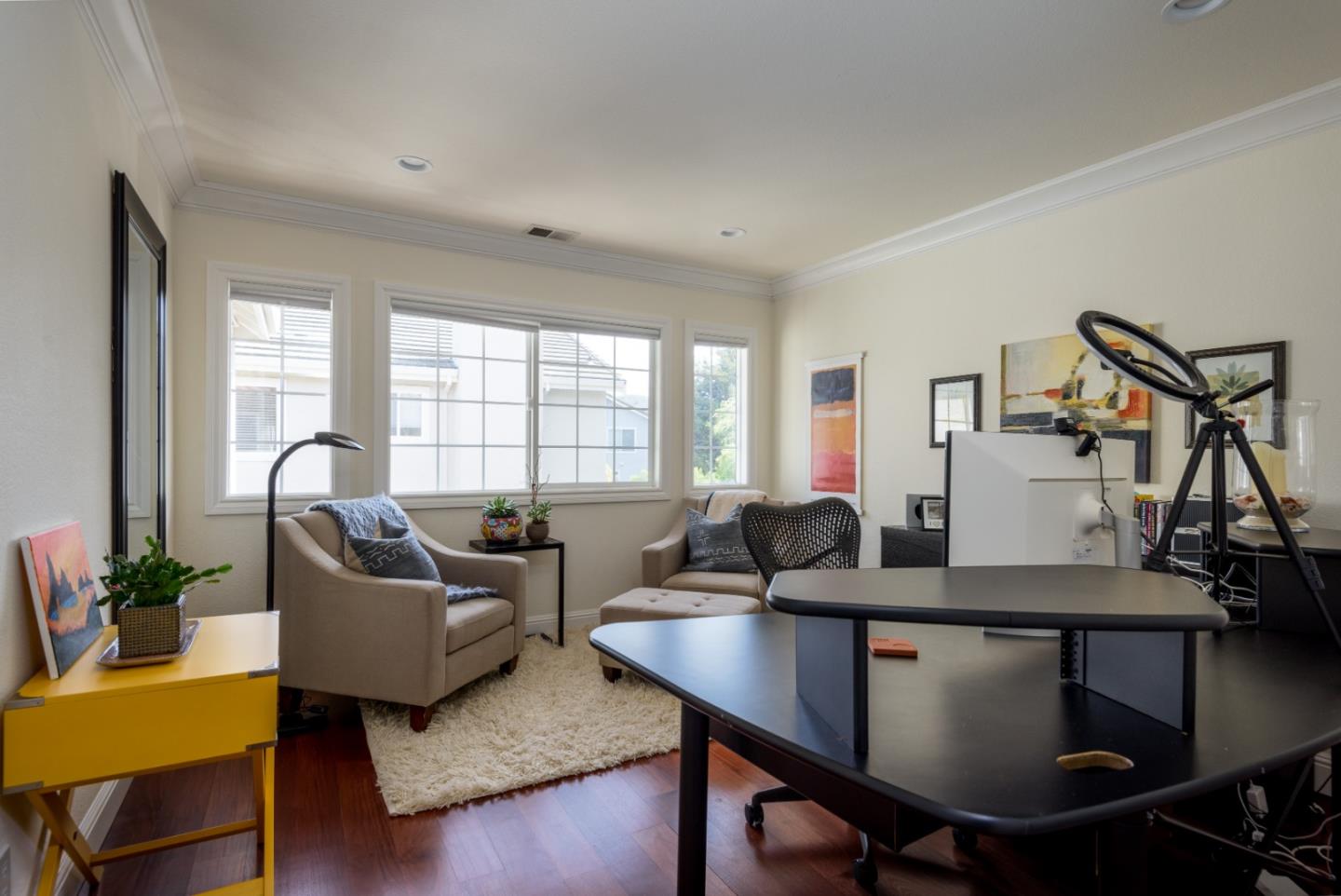 376 Eagle Trace Drive Half Moon Bay, CA 94019 - Photo 25 of 43 a living room with furniture and a wooden floor