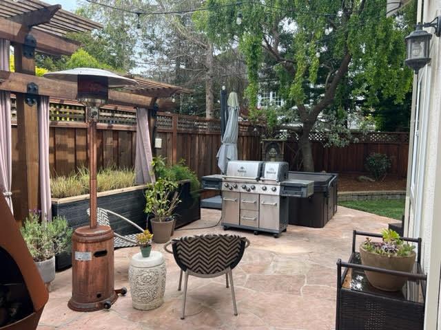 376 Eagle Trace Drive Half Moon Bay, CA 94019 - Photo 27 of 43 a view of a patio with couches table and chairs and potted plants