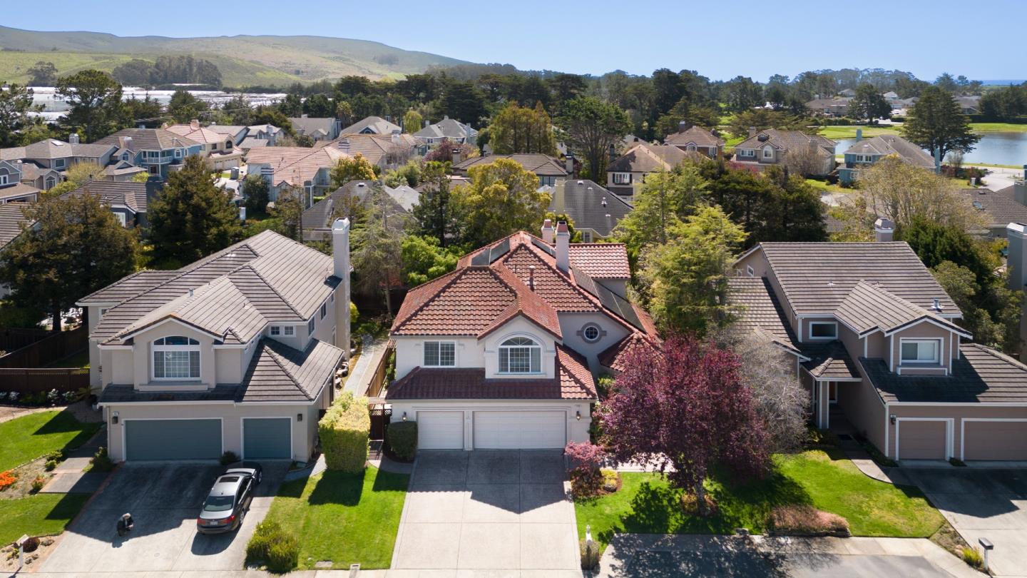 376 Eagle Trace Drive Half Moon Bay, CA 94019 - Photo 40 of 43 an aerial view of multiple houses with a yard