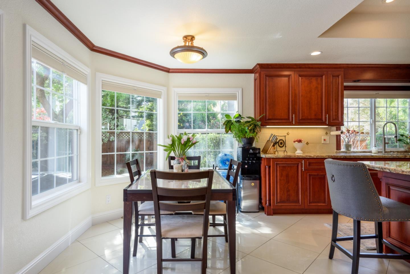 376 Eagle Trace Drive Half Moon Bay, CA 94019 - Photo 10 of 43 a kitchen with a table and chairs in it