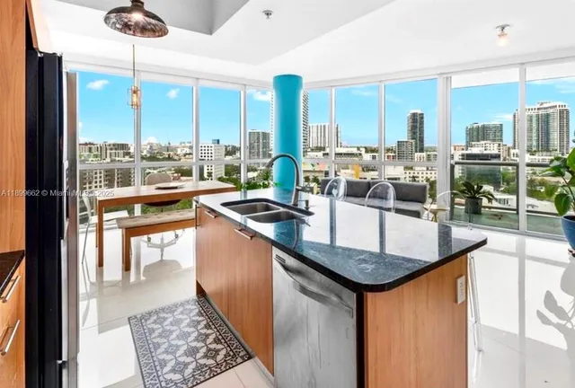 a kitchen with large counter top space