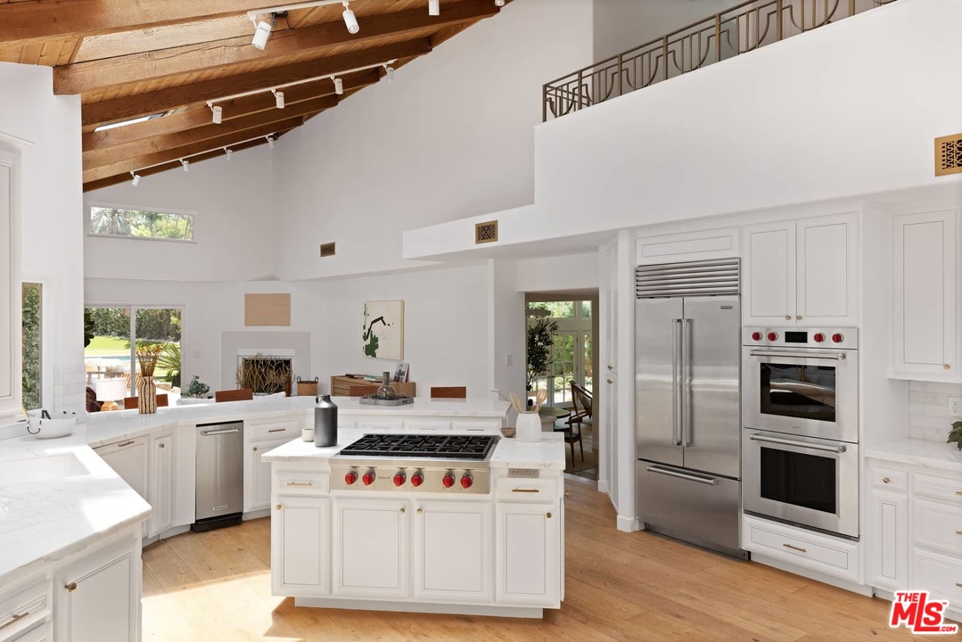 1435 Crest Drive Altadena, CA 91001 - Photo 18 of 54 a kitchen with a stove a refrigerator and a stove
