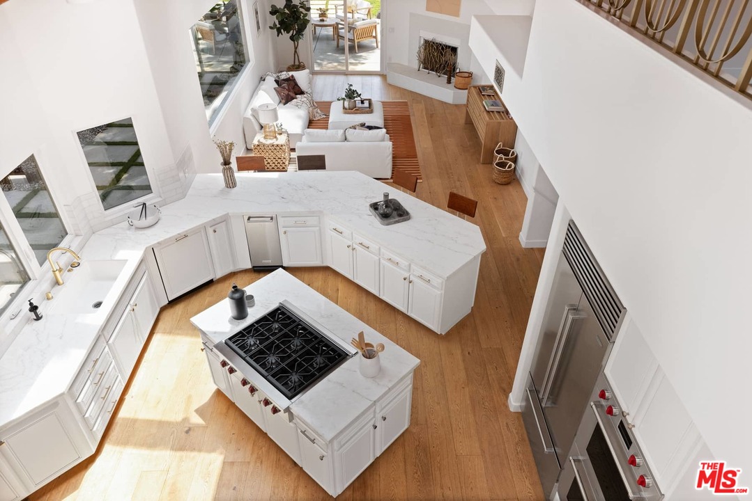 1435 Crest Drive Altadena, CA 91001 - Photo 19 of 54 a living room with furniture and a fireplace