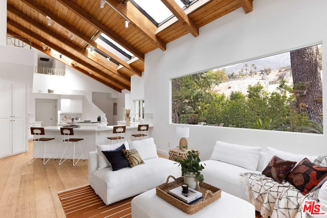 1435 Crest Drive Altadena, CA 91001 - Photo 3 of 54 a living room with furniture and a large window