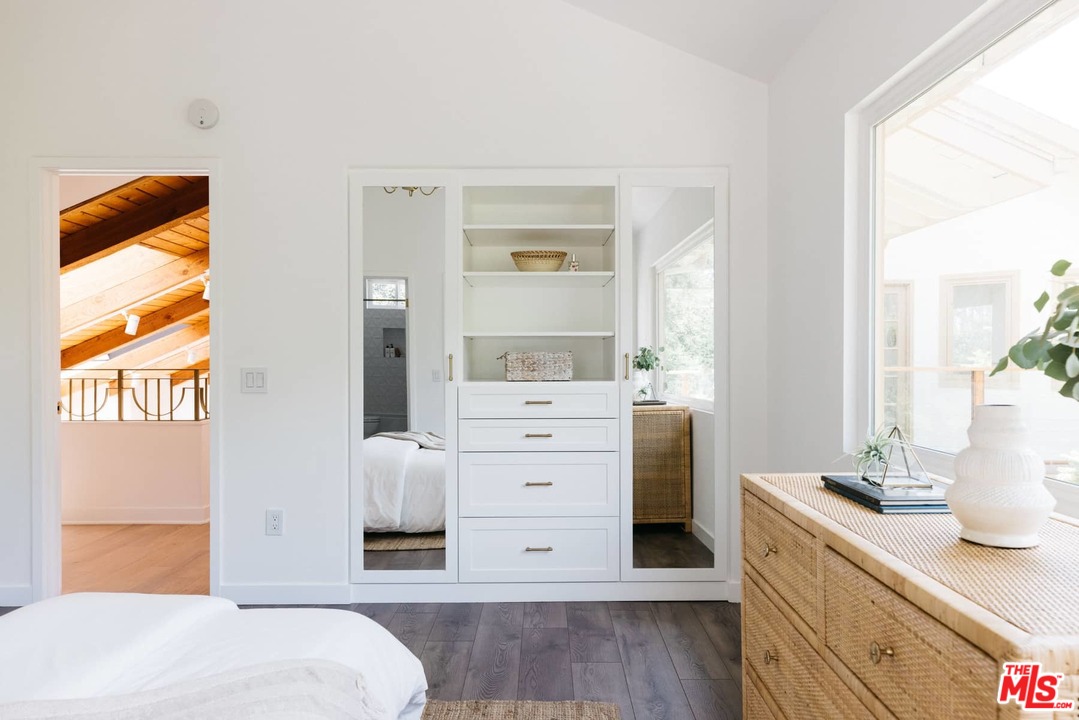 1435 Crest Drive Altadena, CA 91001 - Photo 25 of 54 a bedroom with a bed and a dresser