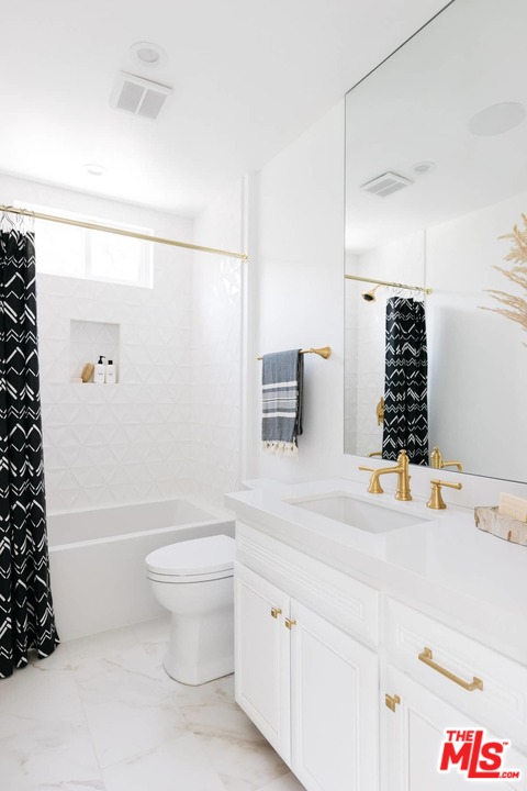 1435 Crest Drive Altadena, CA 91001 - Photo 26 of 54 a bathroom with a sink toilet and shower