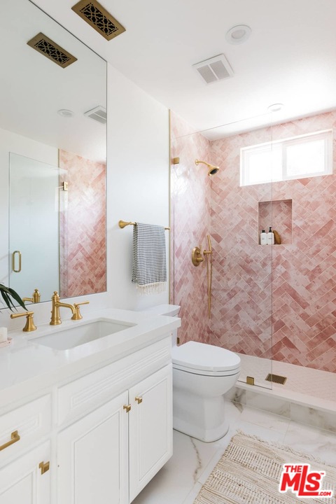 1435 Crest Drive Altadena, CA 91001 - Photo 28 of 54 a bathroom with a sink and a mirror