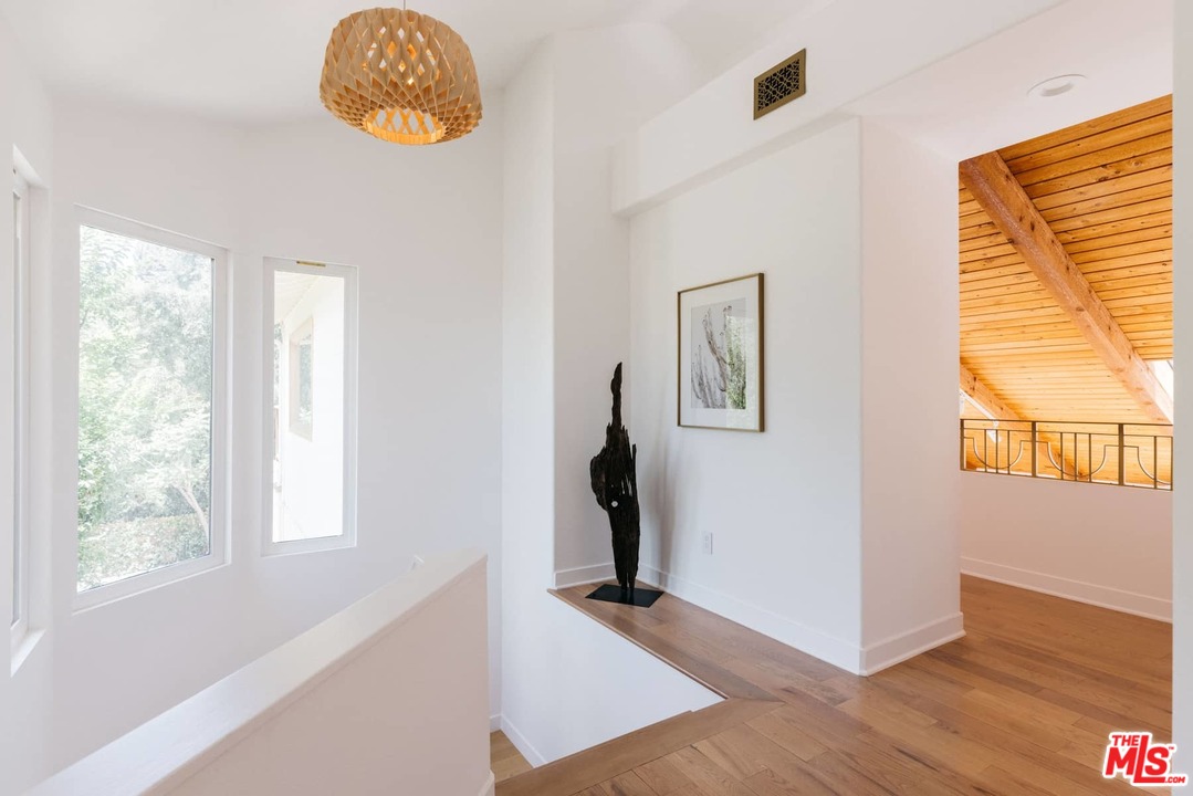 1435 Crest Drive Altadena, CA 91001 - Photo 30 of 54 a view of an entryway with wooden floor